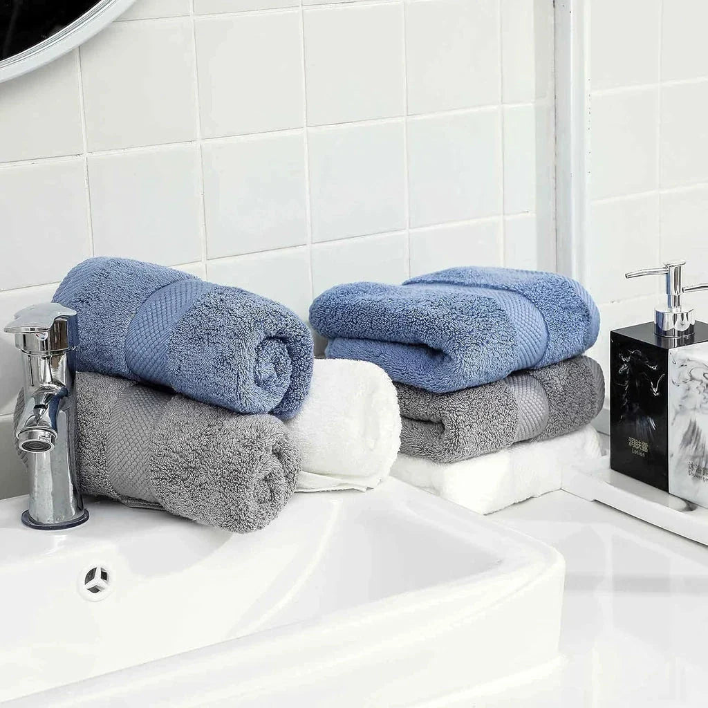 Premium 100% cotton face towel in blue, featuring a soft and absorbent design for daily facial cleansing and bathing