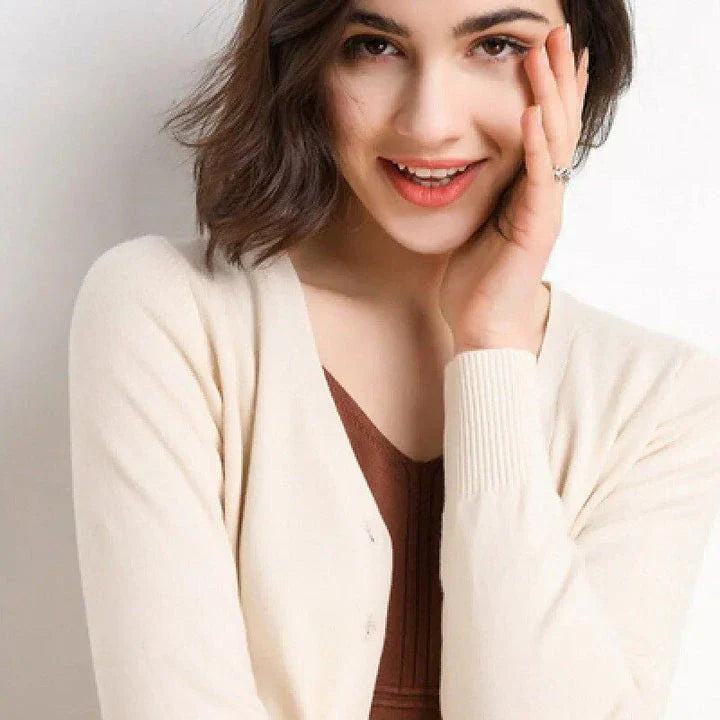 Chic v-neck single breasted cardigan in blue, green, and pink colours with a sophisticated and timeless design