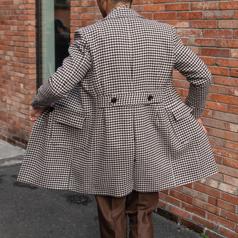 Double-breasted thick houndstooth coat in a vintage-inspired design, featuring a premium wool-rich fabric and a refined silhouette