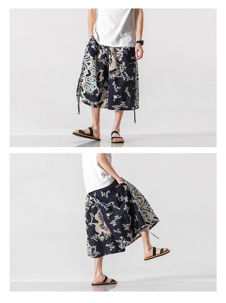 Men's loose-fitting Chinese-inspired cropped pants with a dragon or elephant floral pattern in navy blue, red, or coffee colours