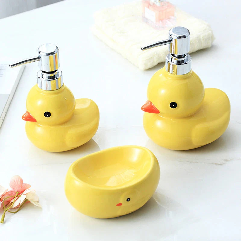 Charming yellow duck ceramic soap dispenser with matching soap dish, perfect for adding a playful touch to your bathroom or kitchen.