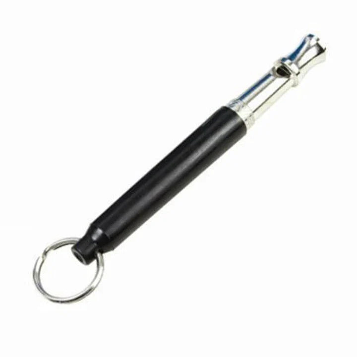 Compact ultrasonic dog training whistle in black and silver color, with a keyring loop for easy attachment