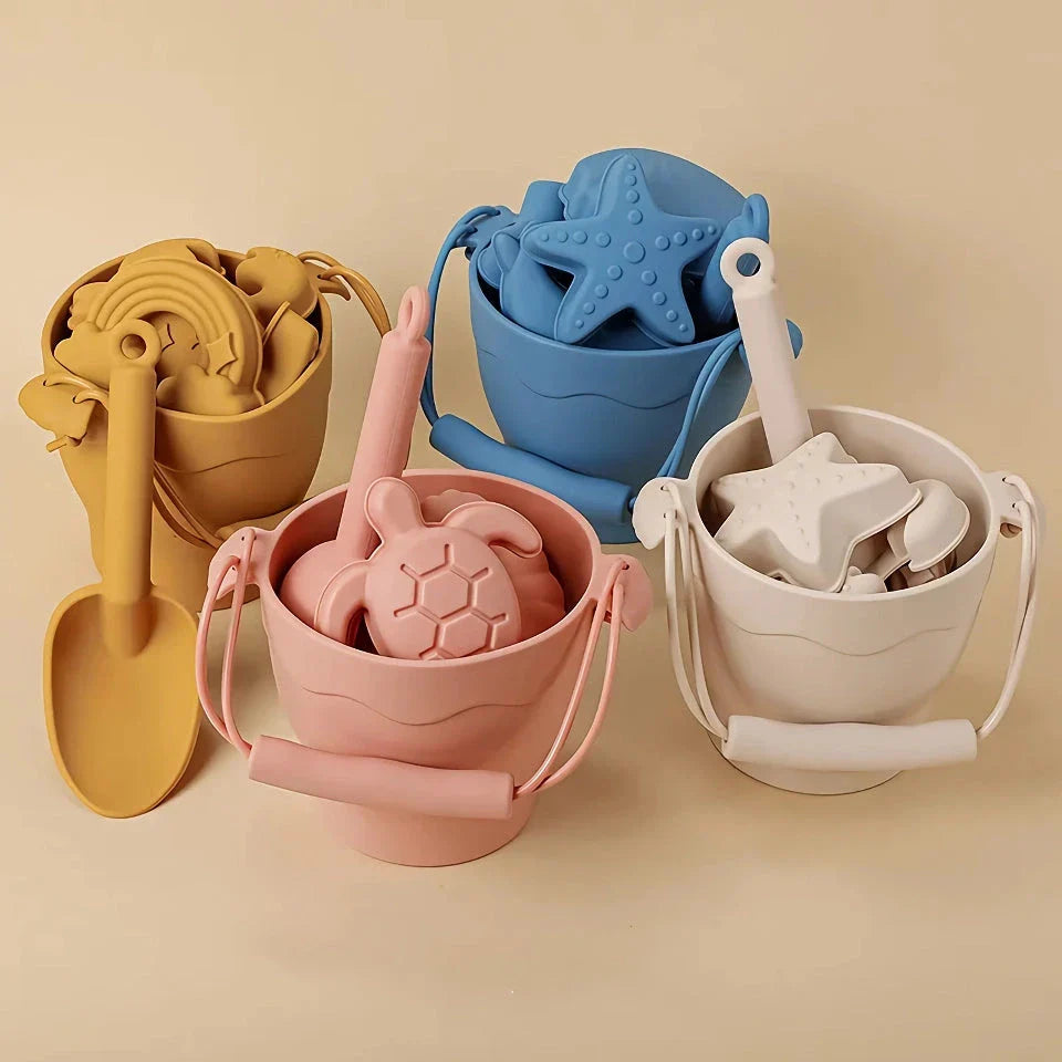 Premium eco-friendly silicone beach playset with bucket, spades, and themed molds for children's creative outdoor play