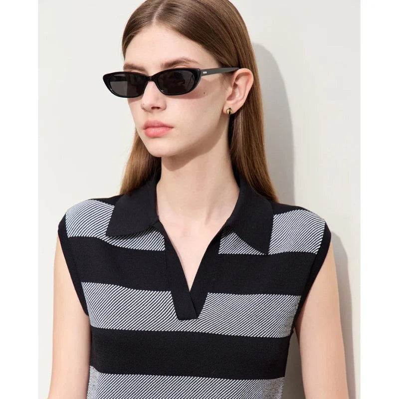 Chic Summer Knit Sleeveless Sweater in a neutral striped pattern, offering a comfortable and stylish option for warm weather wear.