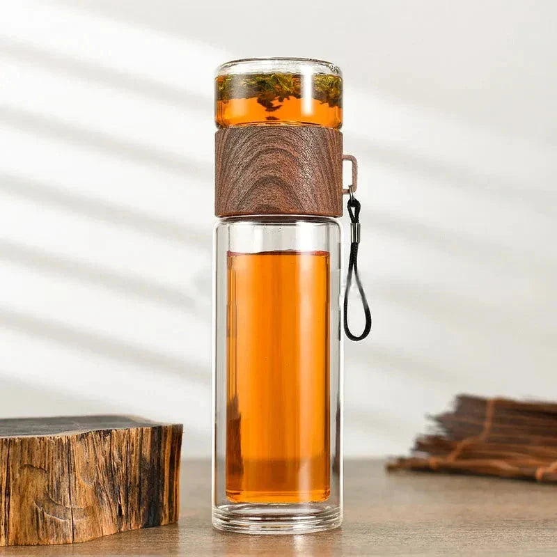 Elegant 400ml double-walled glass tea infuser bottle with wooden accent, perfect for brewing loose leaf tea or infusing water
