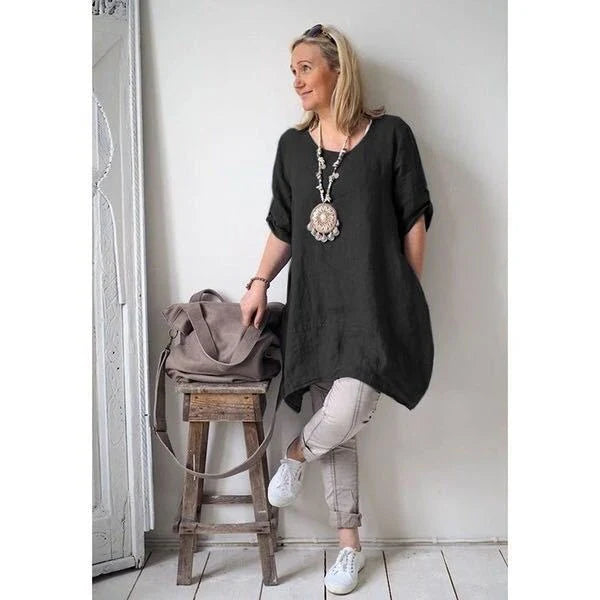 Irregular hem dress in a stylish beige colour, featuring a unique asymmetrical hemline and a comfortable cotton blend fabric