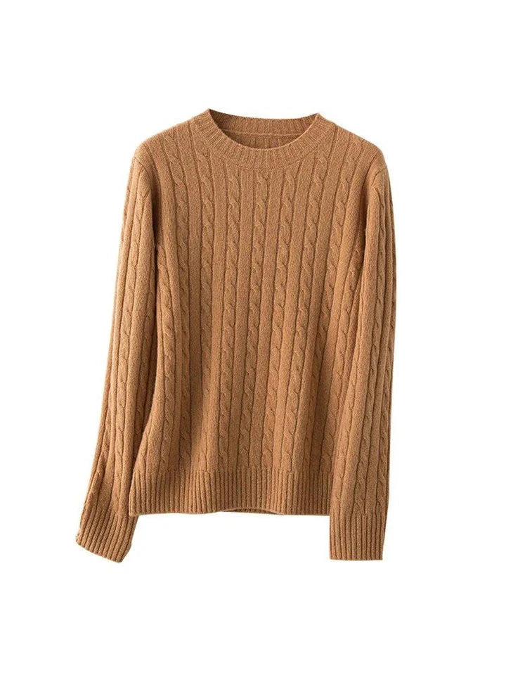 A luxurious 100% British wool cable knit jumper in a rich camel colour, perfect for keeping warm during the UK's chilly winters.