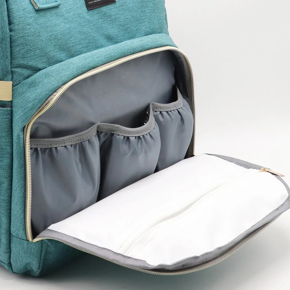 Multifunctional maternity diaper backpack with removable mosquito net, foldable crib, and water-resistant design for convenient family travel