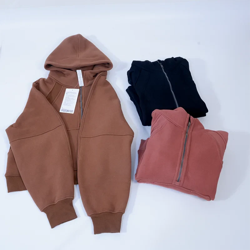 Premium women's sports fleece hoodie with half zip, available in a range of sophisticated colours