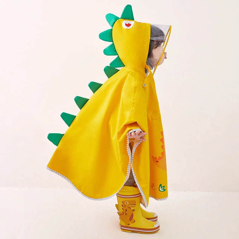 A colourful dinosaur-themed waterproof rain poncho for children, designed to keep them dry and happy during outdoor activities.