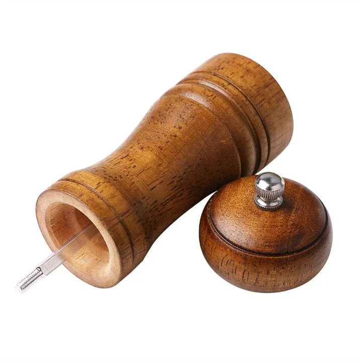 Premium eco-friendly wooden spice grinder with stainless steel accents, designed for consistent spice grinding and sustainable kitchen use.