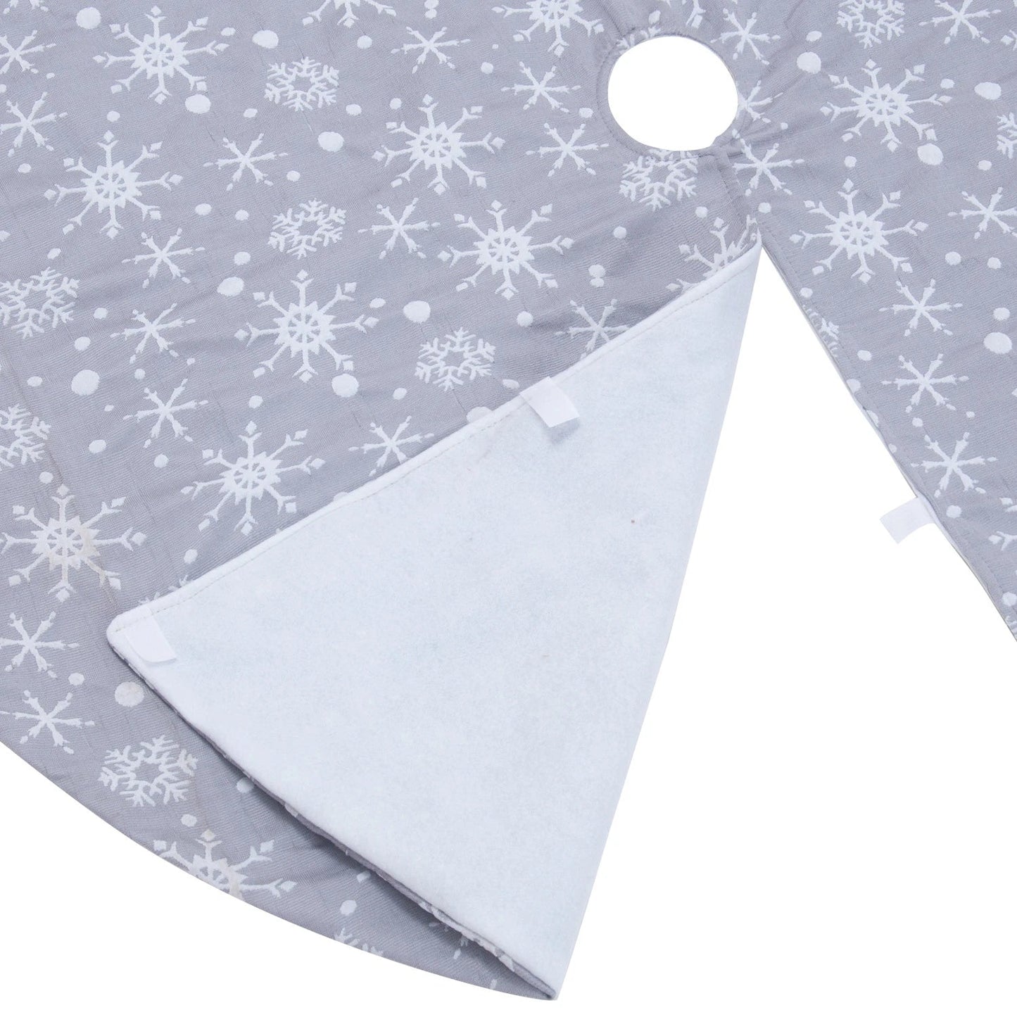 Premium grey background tree skirt with delicate white snowflake patterns, perfect for traditional British Christmas decor