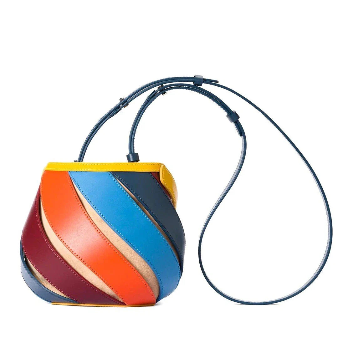 Stylish striped PU leather bucket handbag with versatile carry options and roomy interior