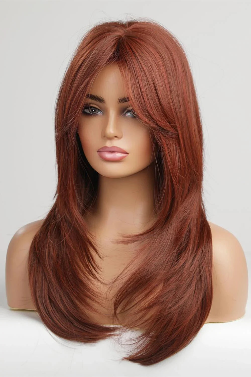 Luxurious mid-length wave synthetic wigs in 20-inch length, featuring a natural and sophisticated look for versatile styling