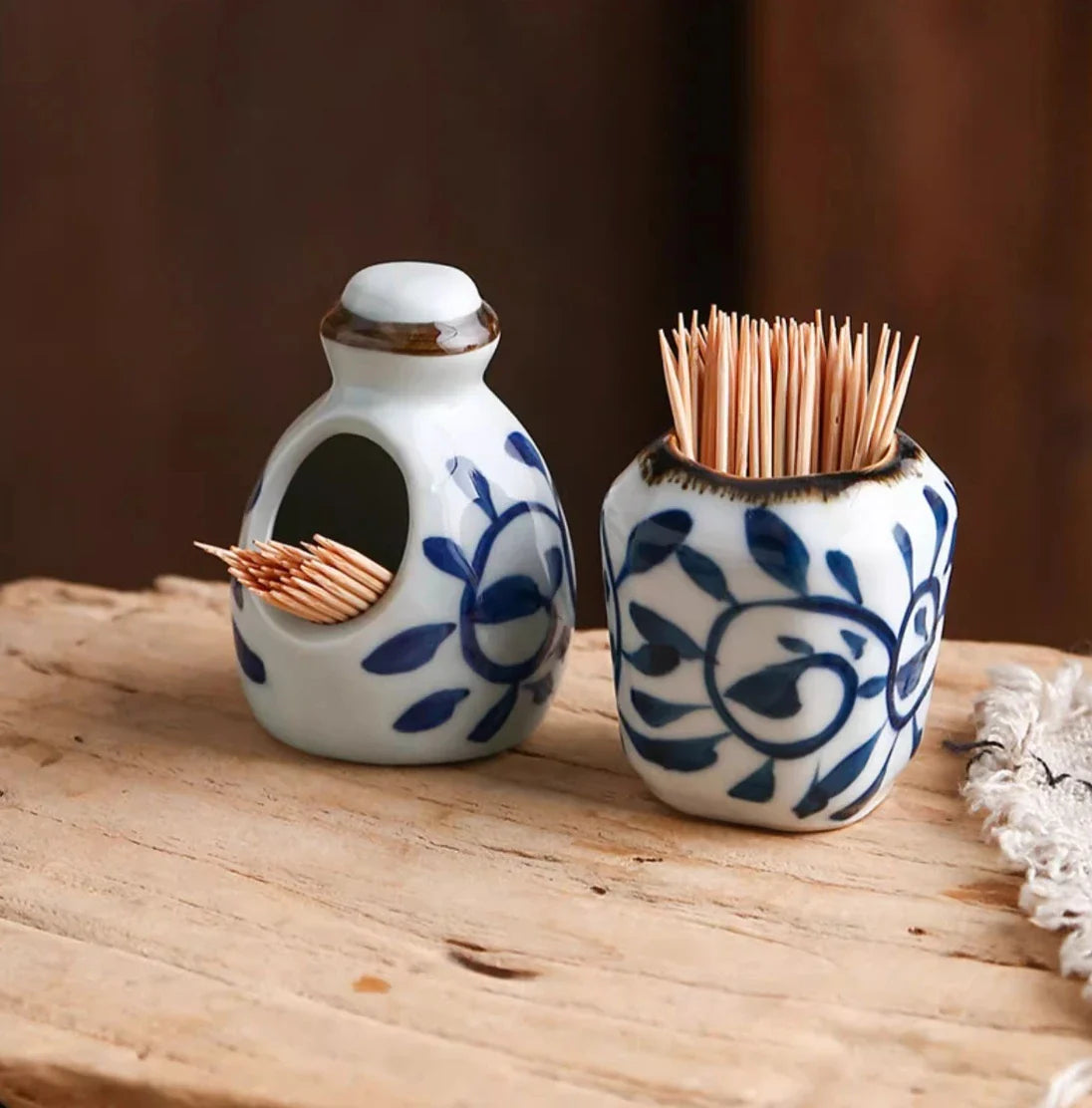 Premium four-piece ceramic seasoning set with oil, vinegar, seasoning, and toothpick holder for a stylish and organized kitchen
