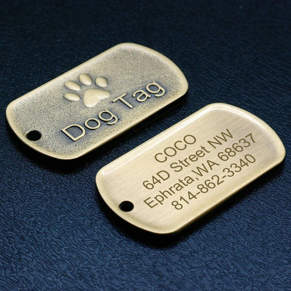 Vintage-style personalized pet ID tag made from durable metal, featuring engraved text for customization and a classic design.