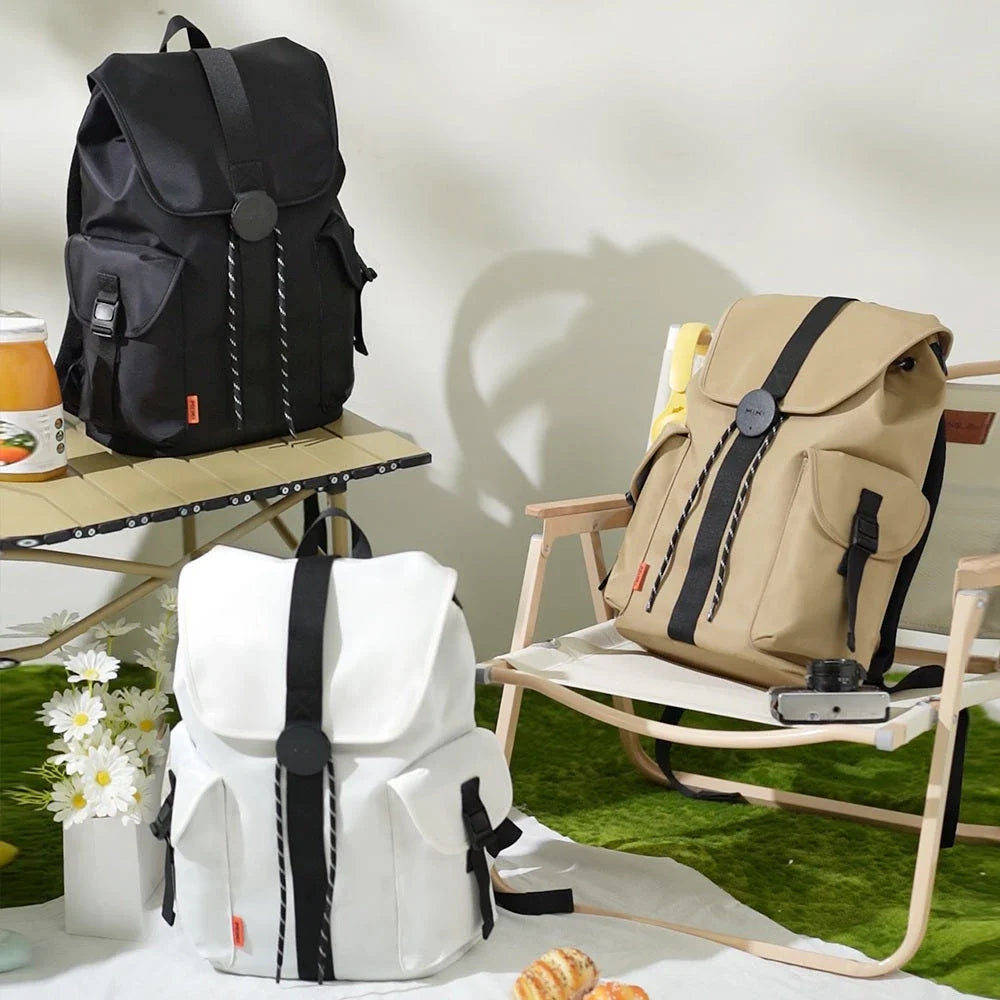 A stylish and versatile 16-inch laptop backpack with a padded compartment, water-repellent fabric, and breathable mesh design