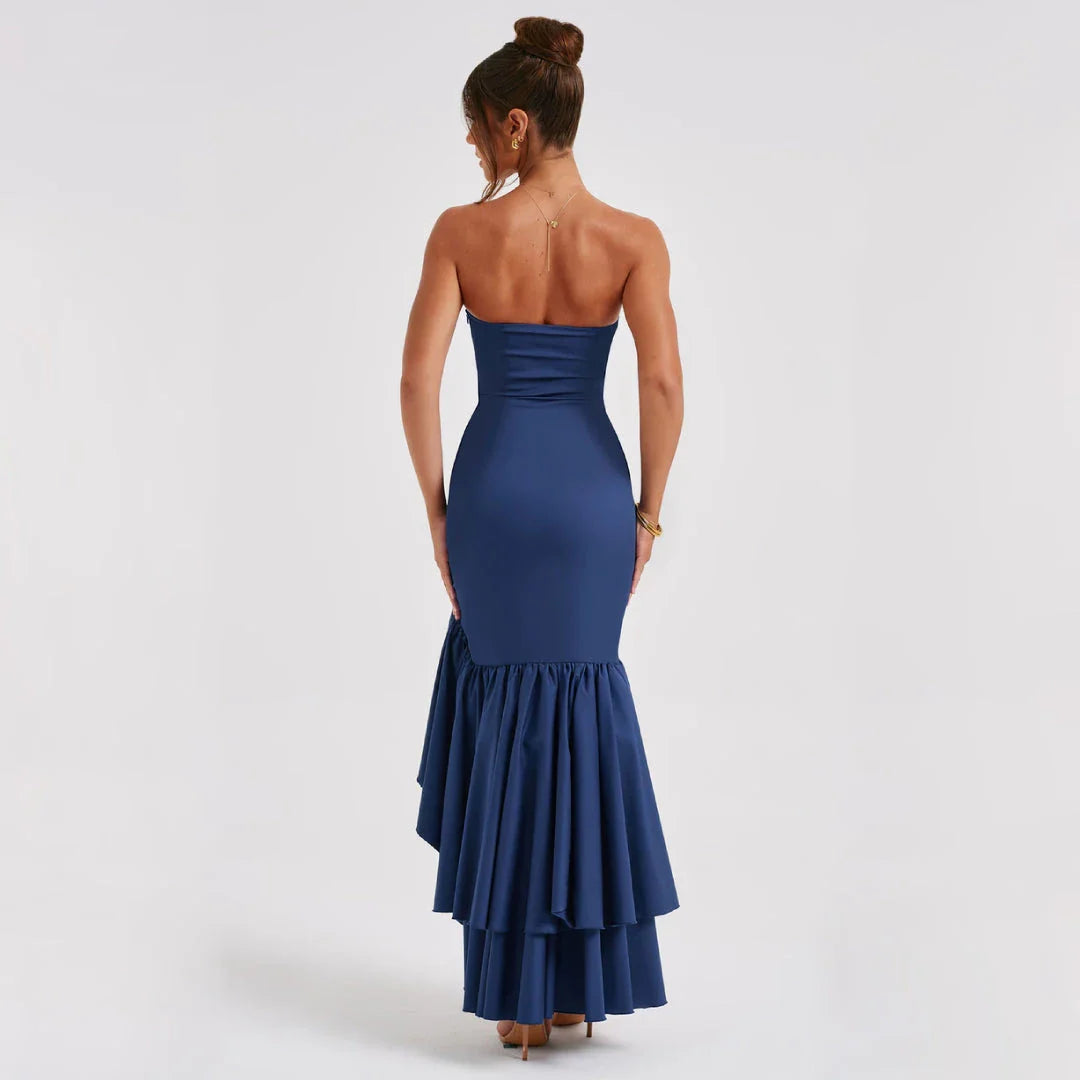 A stunning blue evening dress with an asymmetrical ruffled design, perfect for formal occasions and special events.