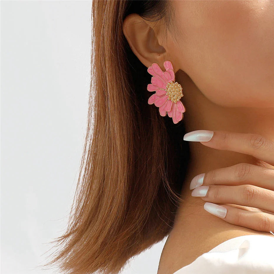 Vibrant, multi-coloured floral petal stud earrings with a blend of bohemian and modern influences