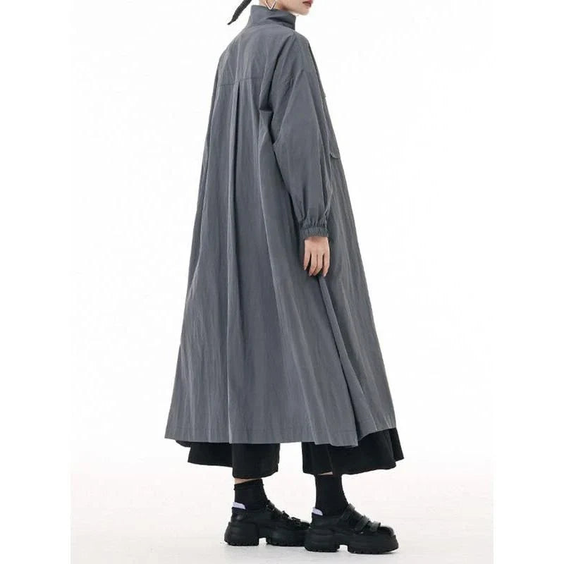 Stylish army green trench coat with mandarin collar, zipper closure, and functional pockets for practical and fashionable all-season wear.