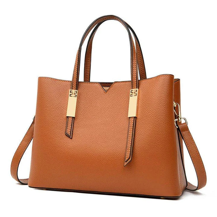 Premium cowhide crossbody handbag in various colour options, featuring a stylish and versatile design for discerning middle-aged shoppers