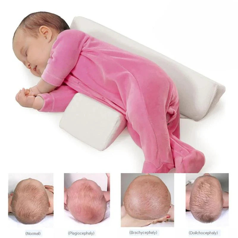 Soft, breathable cotton newborn baby sleeping pillow with adjustable fit and triangular anti-roll design for a comfortable, secure sleeping experience