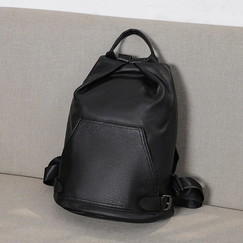 Premium anti-theft leather backpack with cowhide exterior and polyester lining for secure and stylish travel