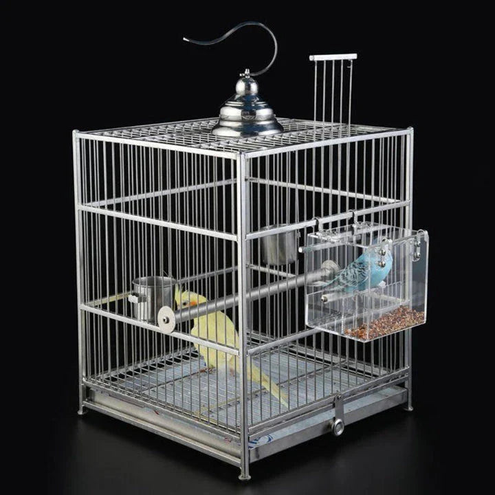 A transparent acrylic bird feeder cube with a sleek and modern design, perfect for adding a touch of elegance to your garden or balcony.
