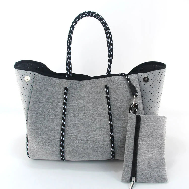 A neoprene beach bag in a stylish design, perfect for British summer adventures at the coast