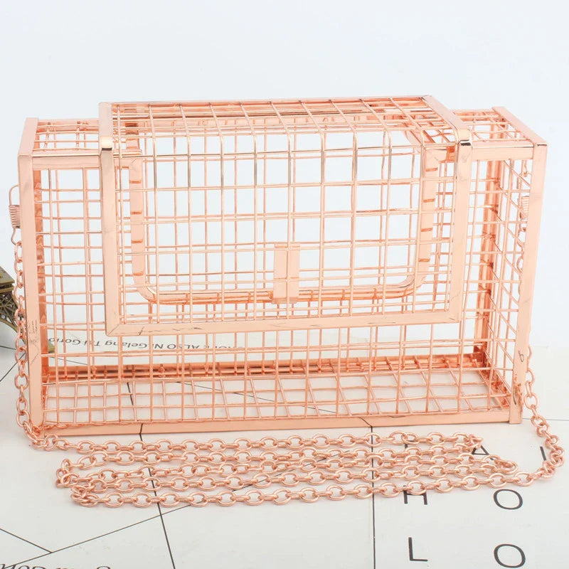 A sophisticated British-designed metal mesh clutch bag with a chain strap, available in various colours and chain styles
