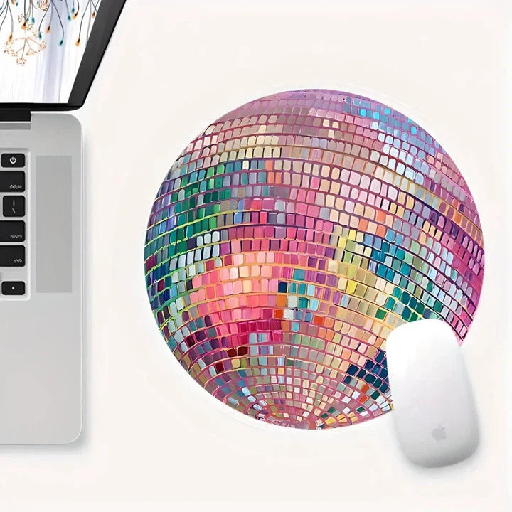 Vibrant pink disco ball pattern mouse pad for a stylish and functional desk accessory