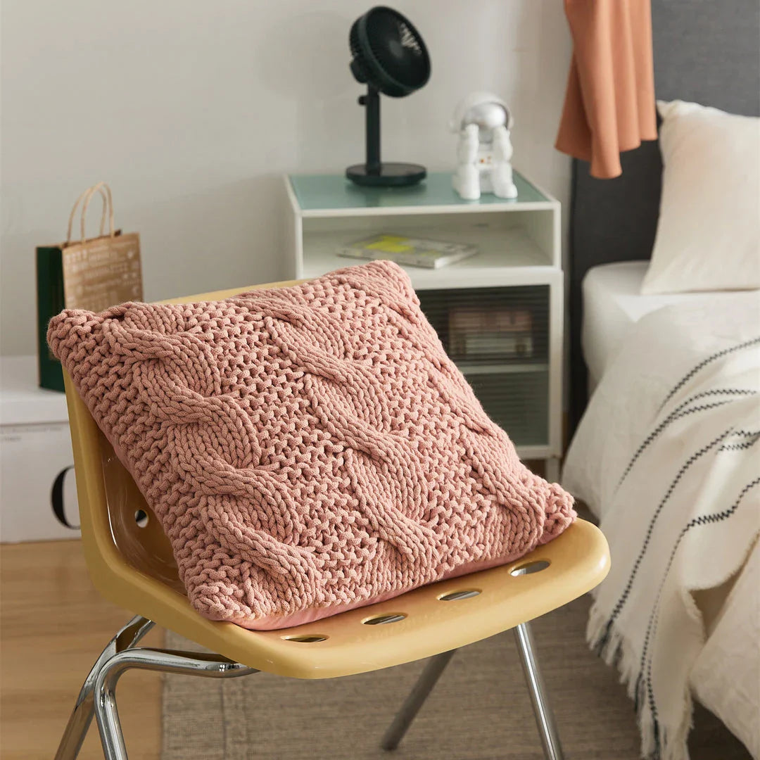 Luxurious hand-crocheted chunky knit throw pillow in a range of vibrant colours, providing cosy comfort and sophisticated style.