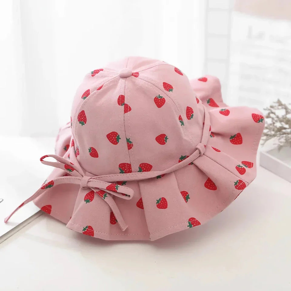 Adjustable white cotton sun protection bucket hat with cartoon pattern for children