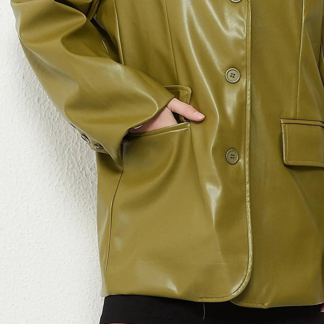 A vintage green single-breasted leather blazer jacket with a turn-down collar and regular sleeves, made from durable polyester material.