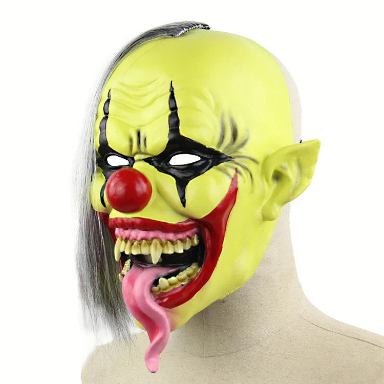 A chilling green-faced clown latex mask with a lifelike and unsettling expression, perfect for Halloween and Christmas festivities.