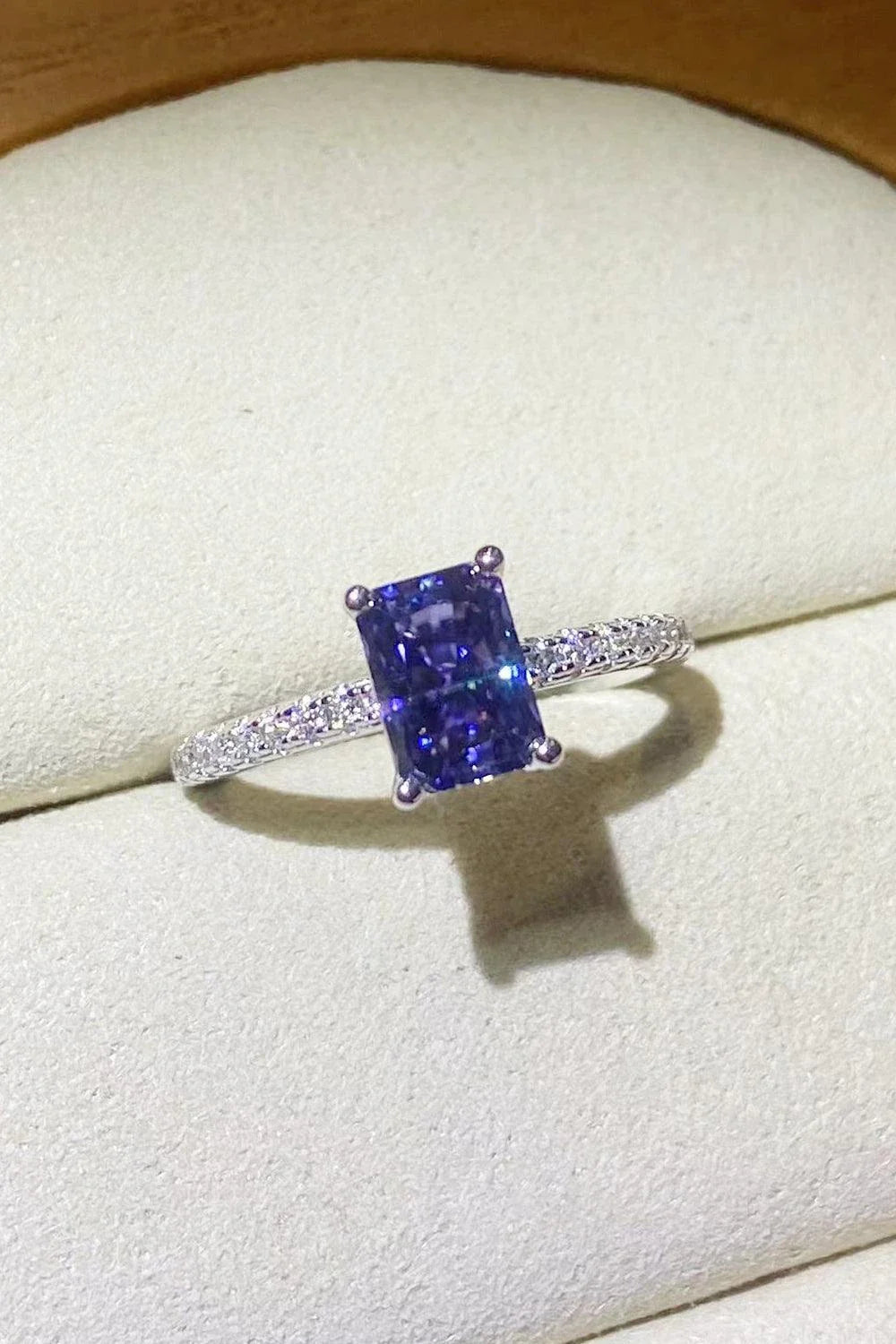 Elegant 1 Carat Moissanite Sterling Silver Ring in a beautiful blue hue, showcasing a minimalist design and premium construction.