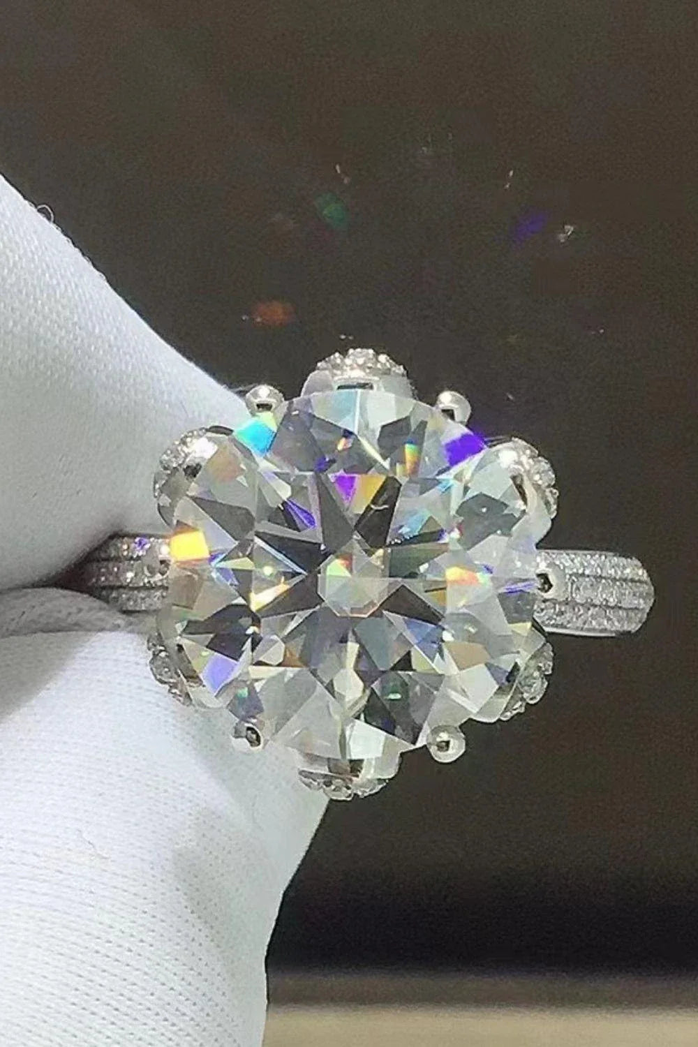 Exquisite 5-carat moissanite ring with zircon accents, crafted in 925 sterling silver with a sleek, modern design