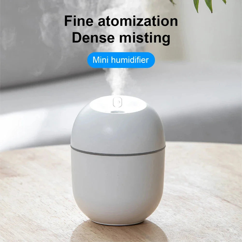 Compact ultrasonic humidifier and aroma diffuser with LED night lamp, available in white colour