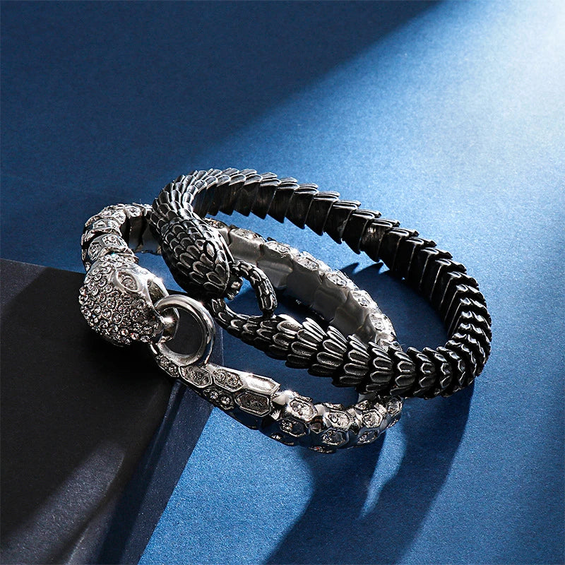 Elegant stainless steel snake bracelet in a sleek, polished black finish for men