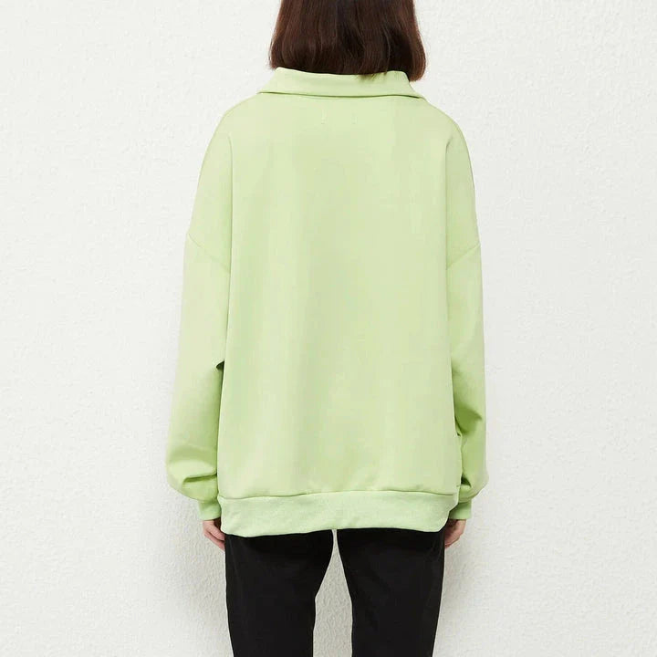 A stylish and comfortable oversize solid pullover with a turn-down collar, perfect for casual wear in the UK.