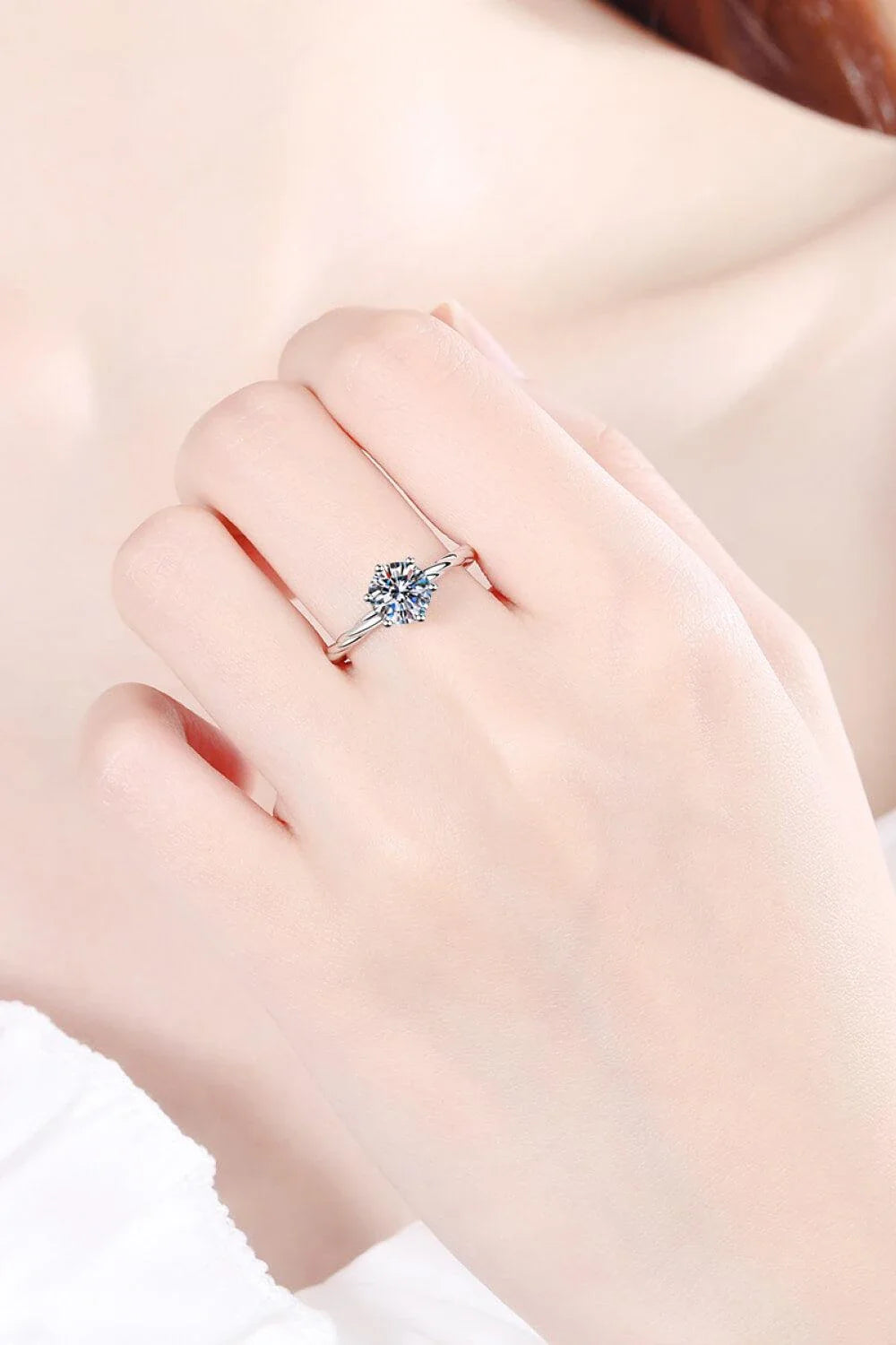 Stunning 1 carat moissanite cocktail ring in 925 sterling silver with a unique twisted setting design