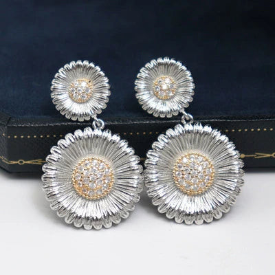 Long Small Daisy Stud Earrings in two-tone design for fashionable British women