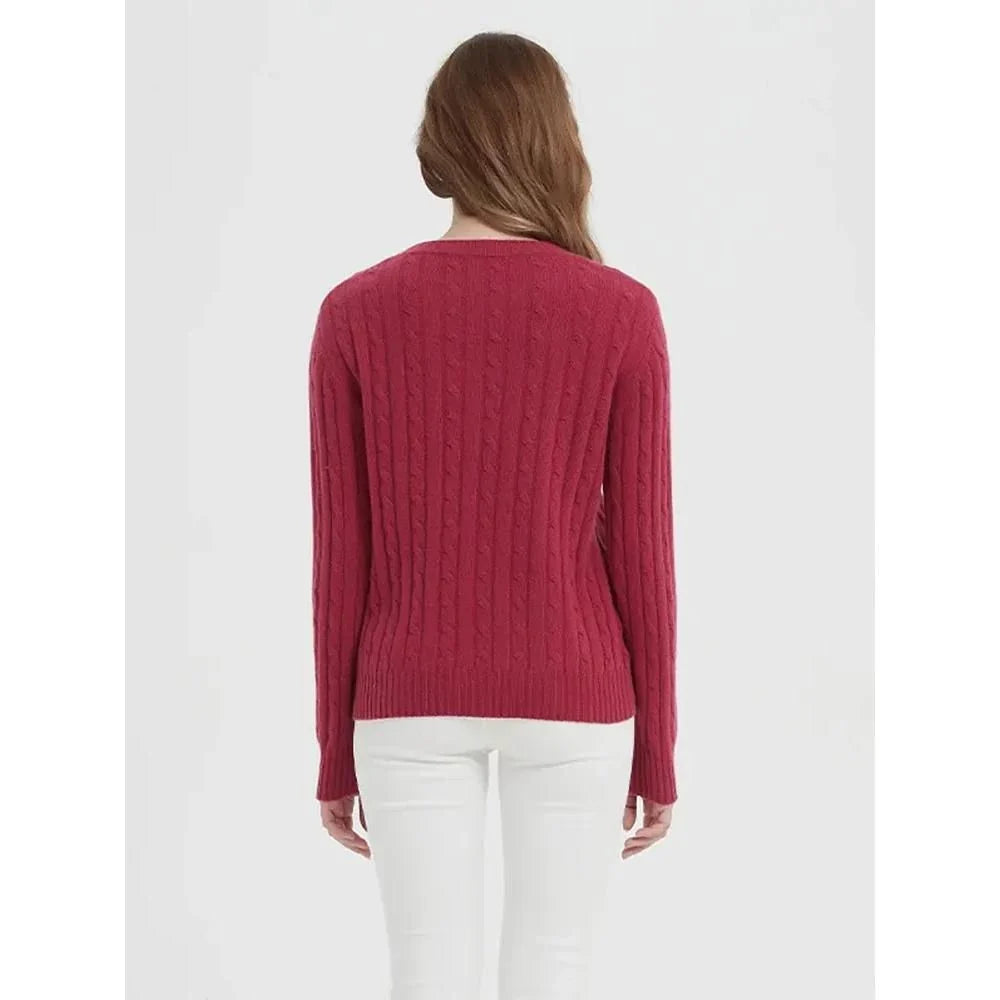 A luxurious 100% British wool cable knit jumper in a rich camel colour, perfect for keeping warm during the UK's chilly winters.