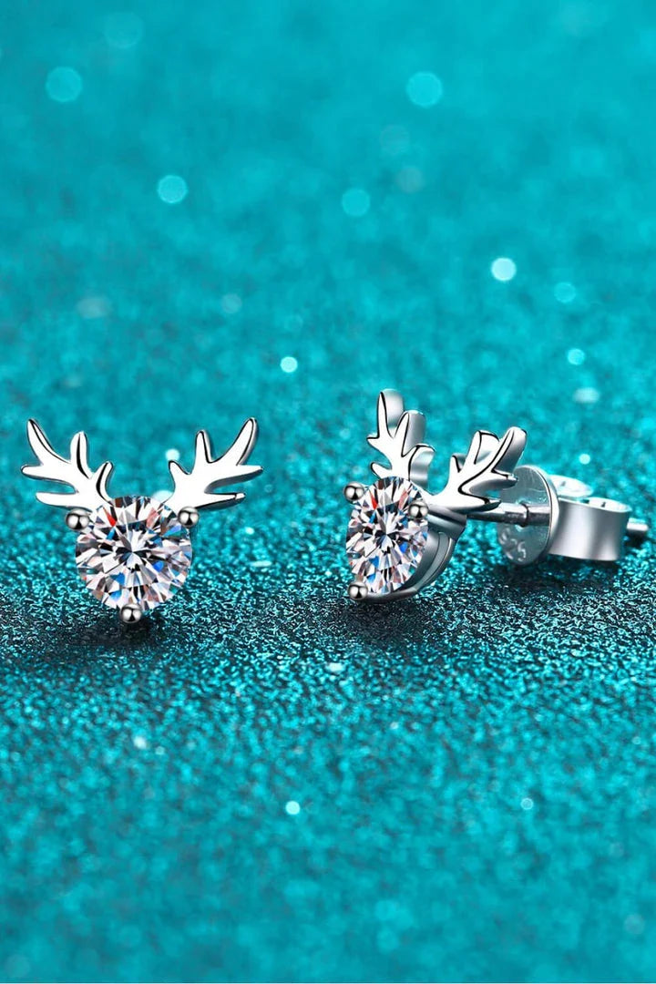 Elegant sterling silver ring featuring a reindeer-shaped moissanite centre stone with a polished finish