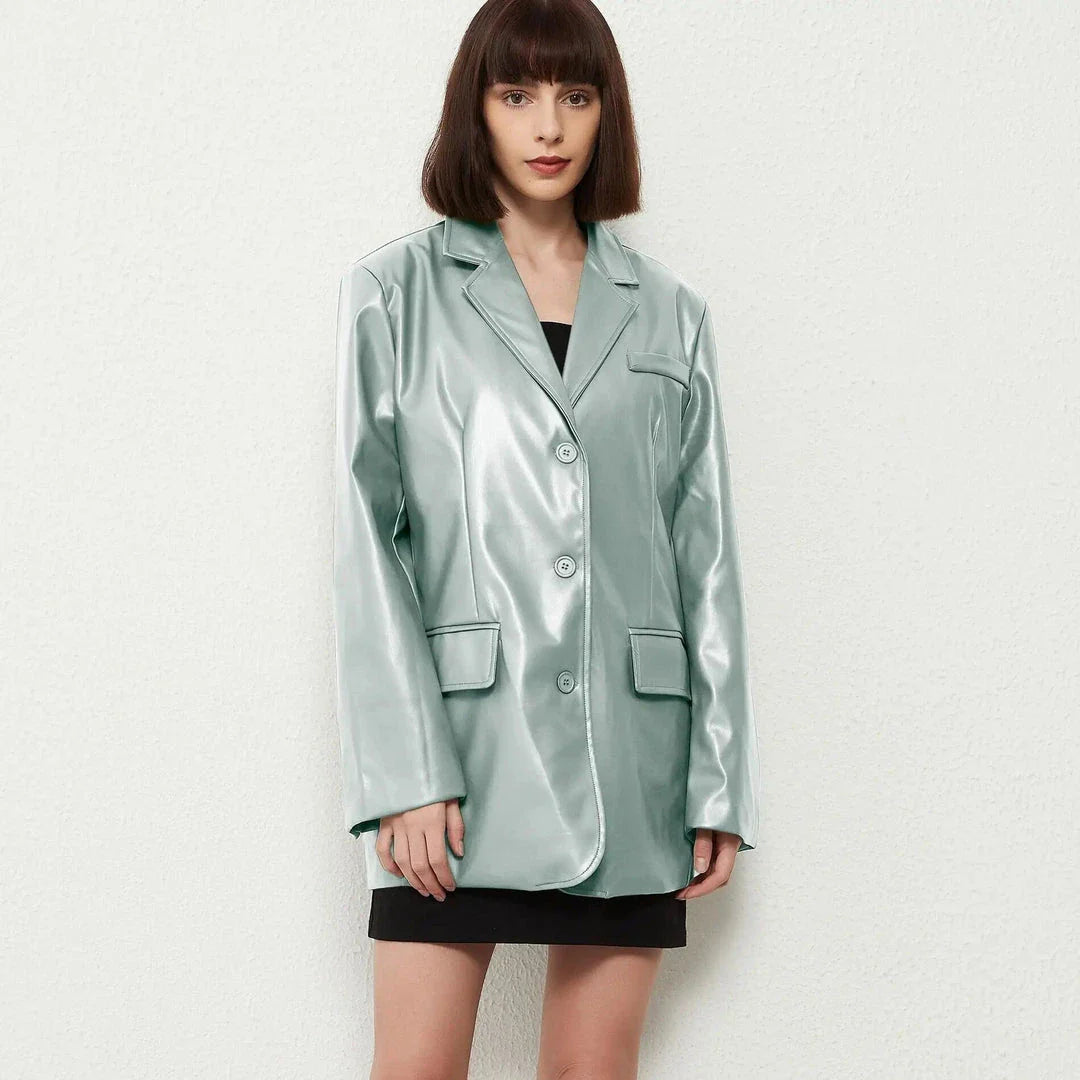 A vintage green single-breasted leather blazer jacket with a turn-down collar and regular sleeves, made from durable polyester material.
