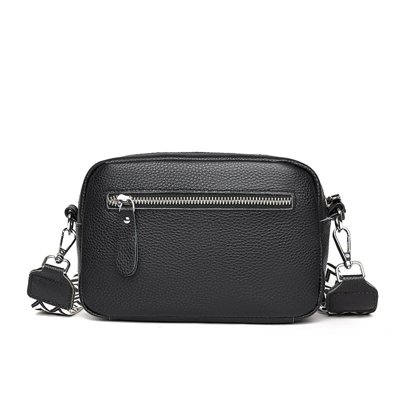 Stylish leather crossbody bag with embroidered strap in various colours