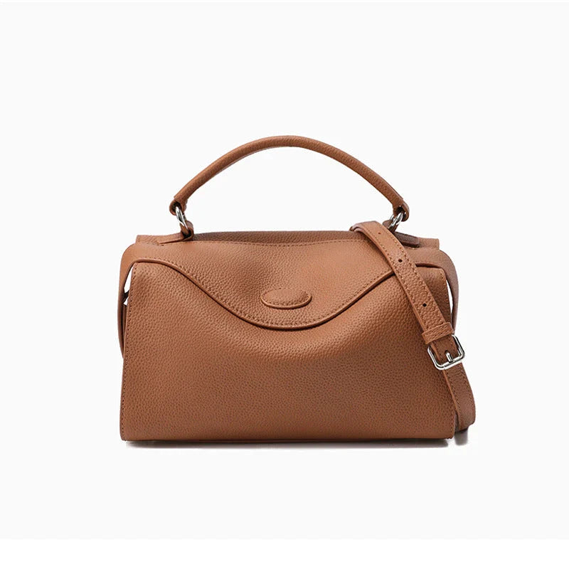 Premium British cowhide leather shoulder bag with multiple interior pockets and adjustable strap for versatile wear