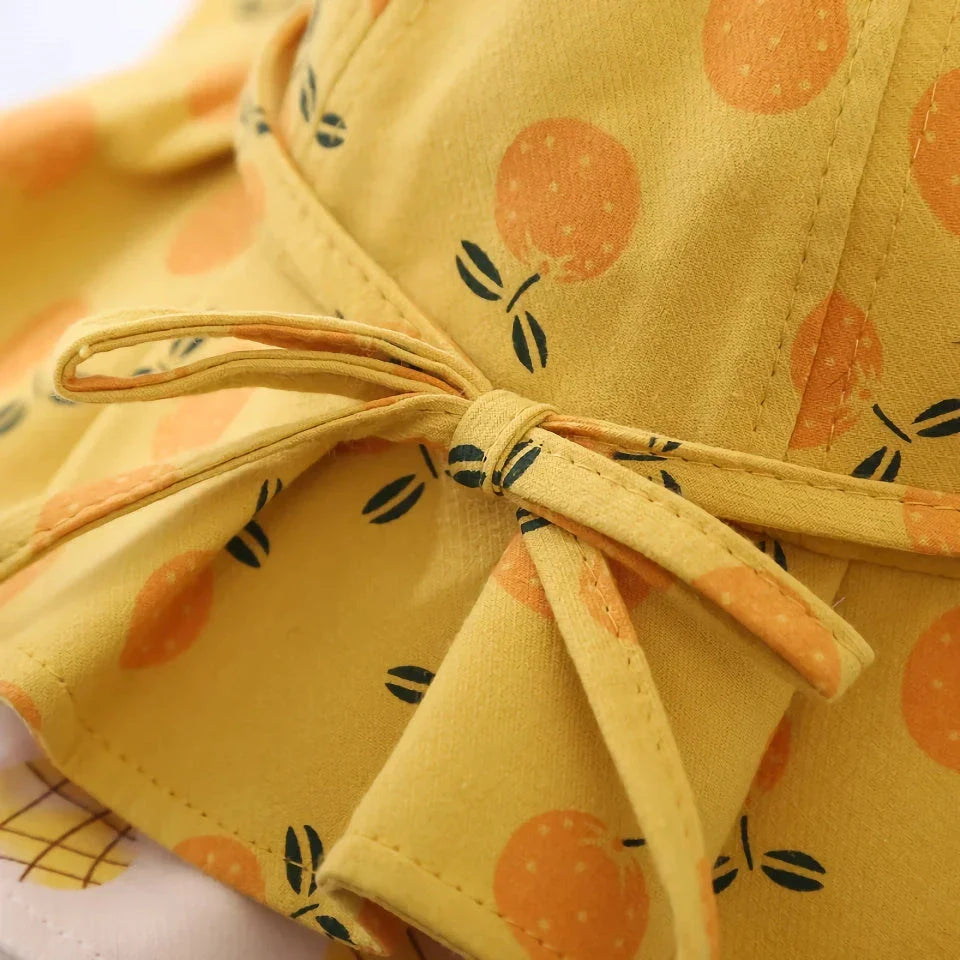Adjustable white cotton sun protection bucket hat with cartoon pattern for children