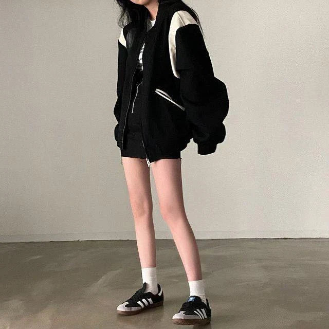 Comfortable and relaxed black baseball uniform for students, featuring a loose fit design and premium cotton construction.