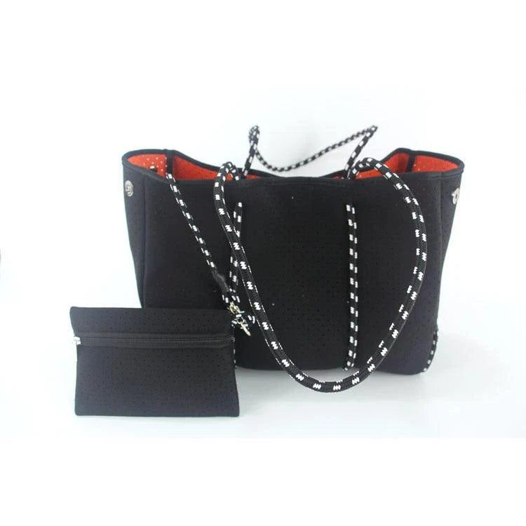 A neoprene beach bag in a stylish design, perfect for British summer adventures at the coast